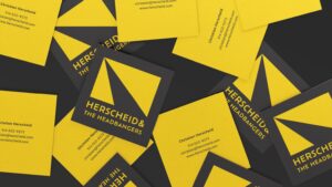 Herscheid & Headbangers yellow and black square business cards