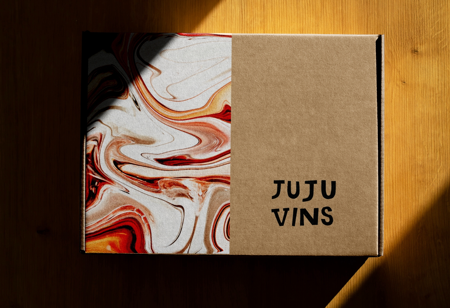 Box with JuJu Vins logo and branding